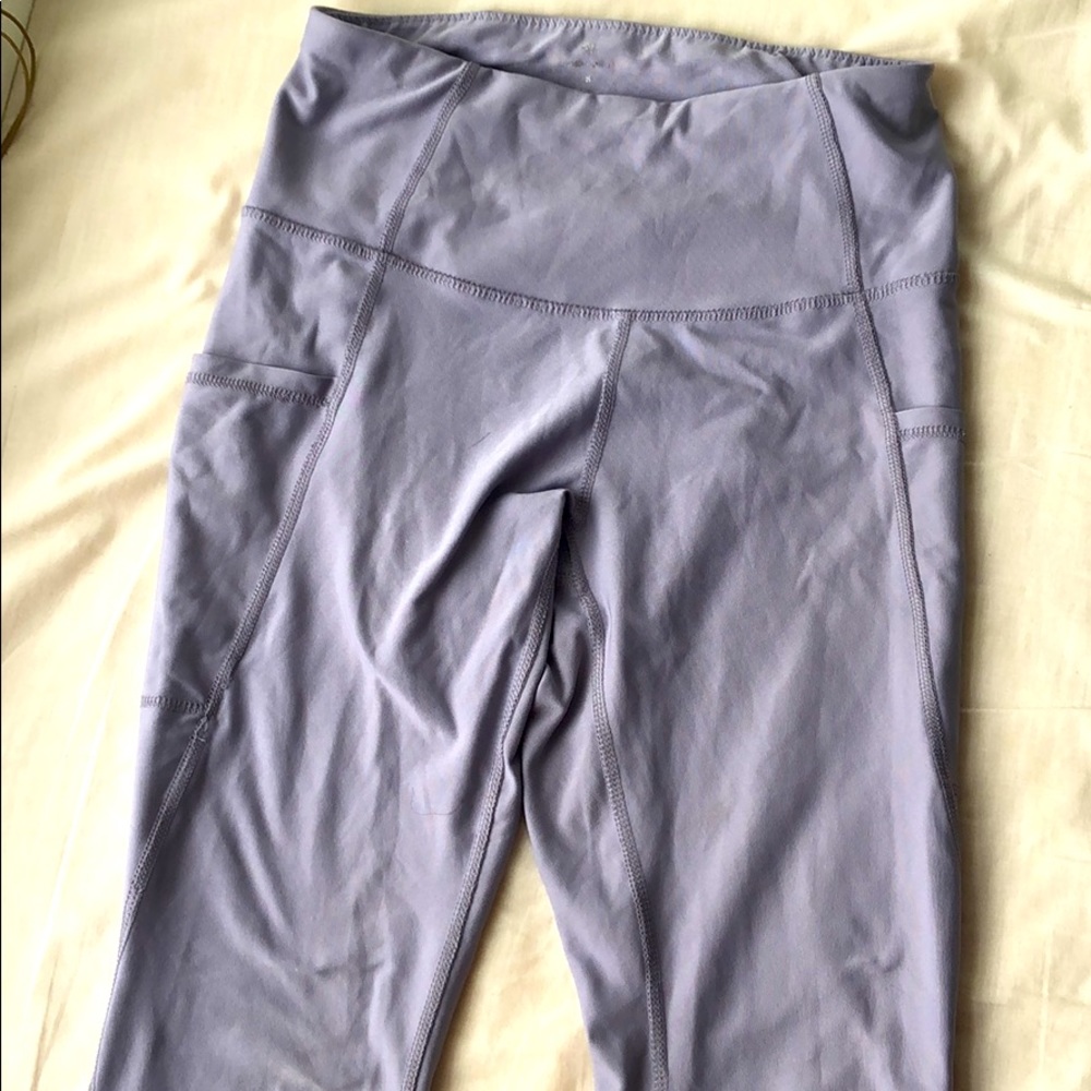 Purple leggings with side pockets